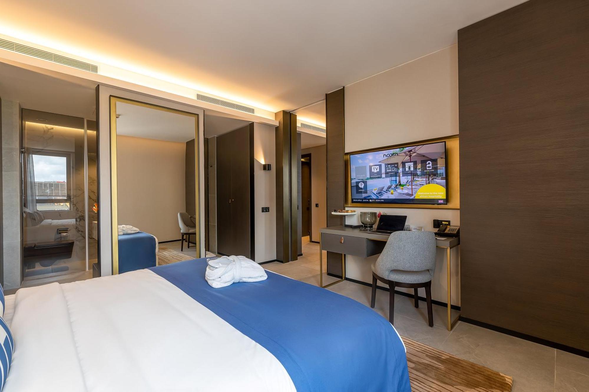 Noom Hotel Abidjan Plateau Kültér fotó Deluxe Room
